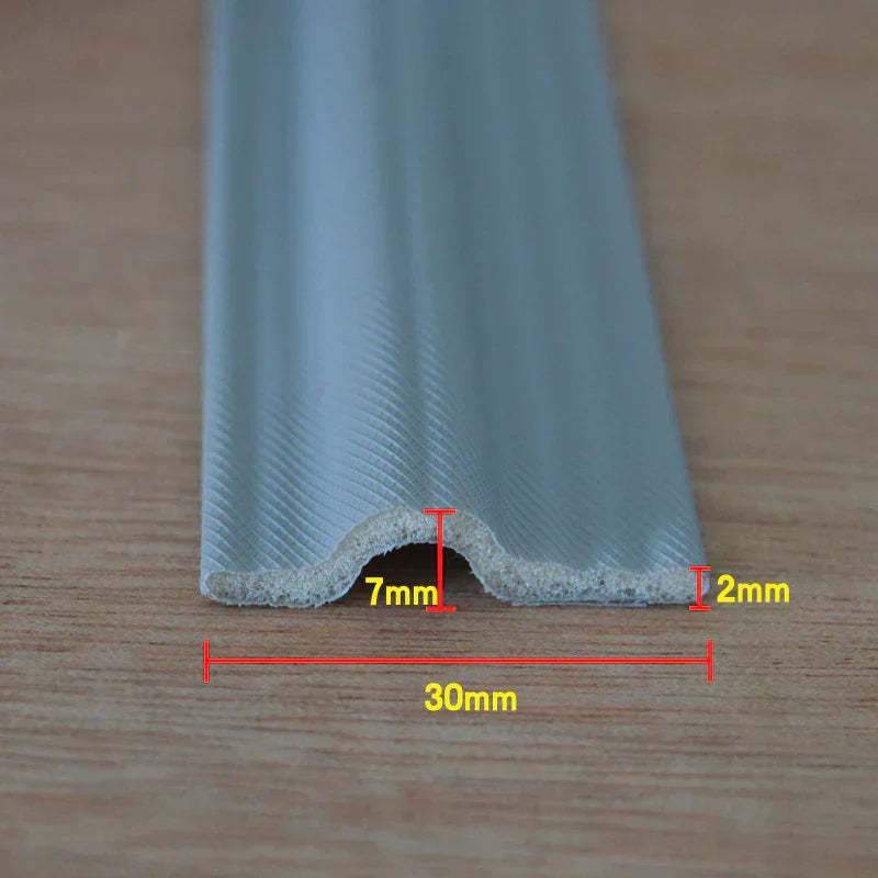 Adhesive door bottom sweep preventing dust and insects from entering room