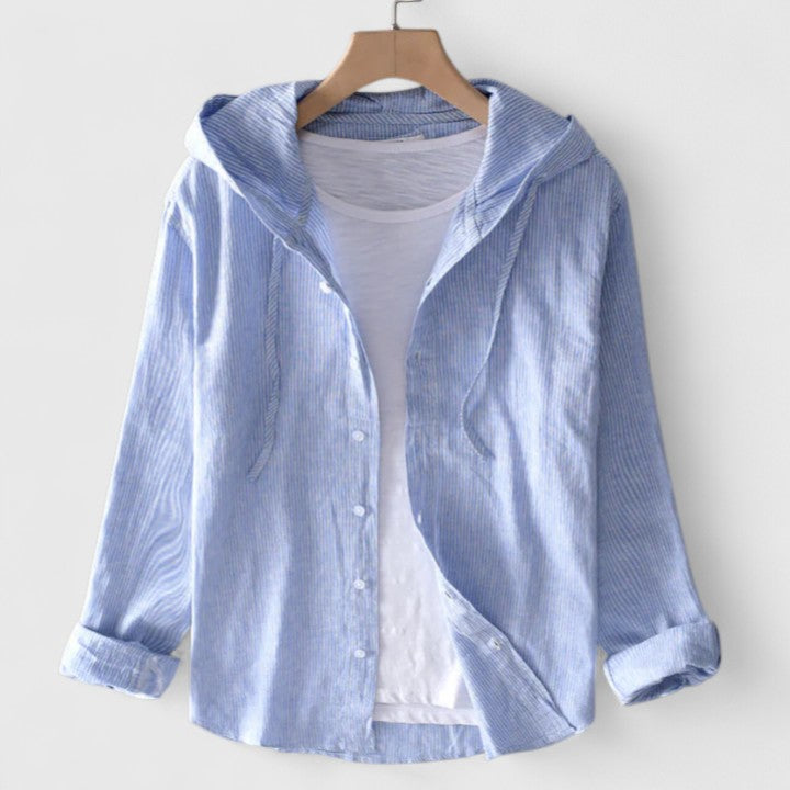Blue hooded long-sleeve blouse displayed on a wooden hanger with white inner layer