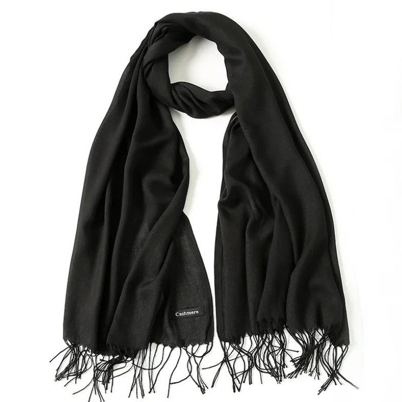 Black winter scarf displayed flat with fringe details