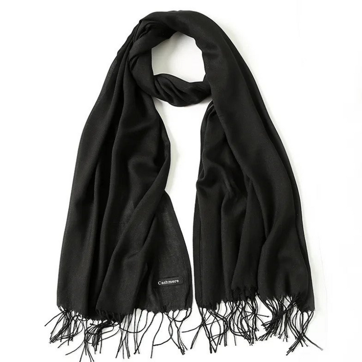 Black winter scarf displayed flat with fringe details
