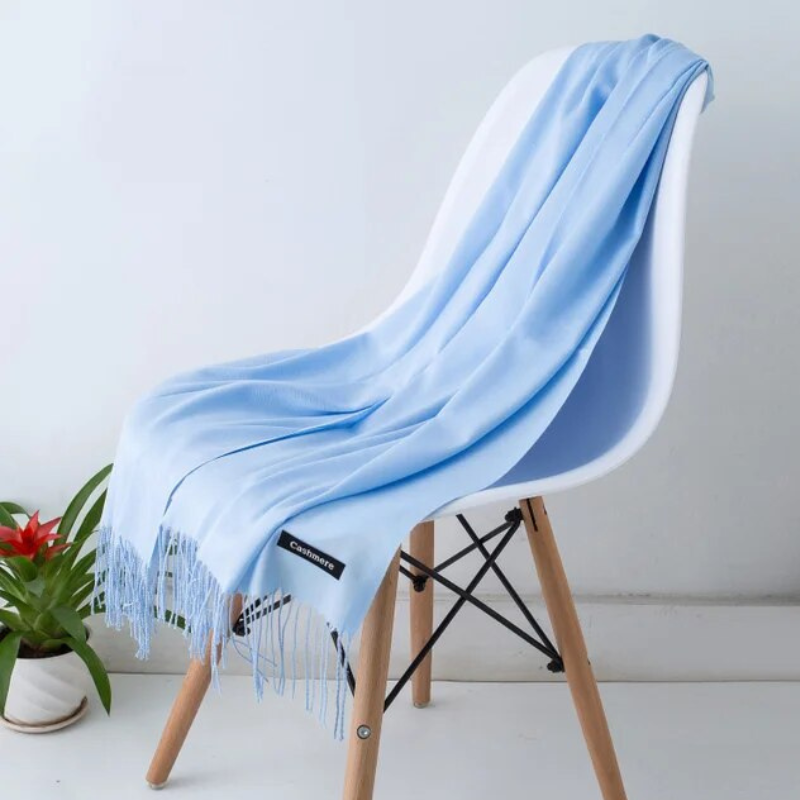 Cozy winter scarf displayed neatly in a retail gift presentation style
