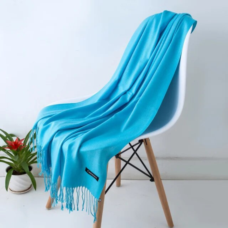 Elegant drape of the women's winter scarf in natural daylight