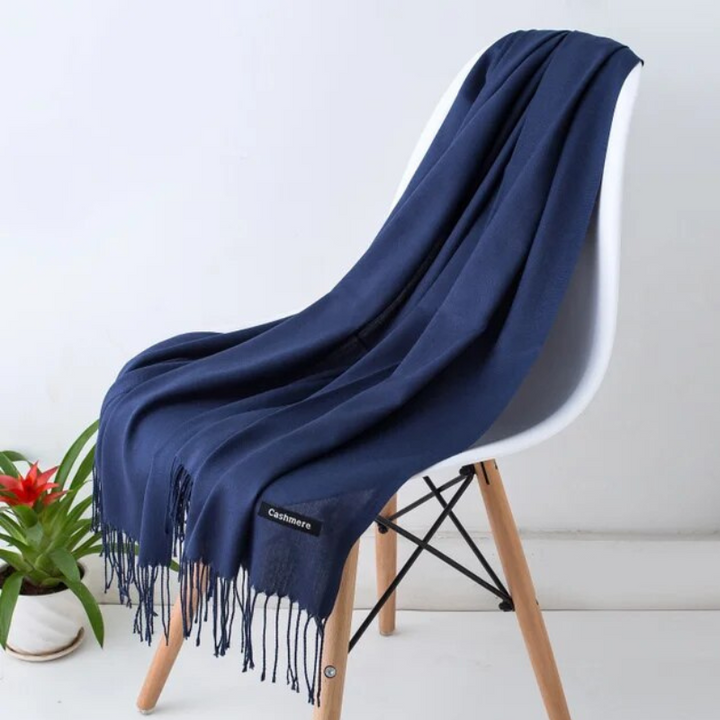 Neutral colored women scarf matching a casual cold-weather sweater