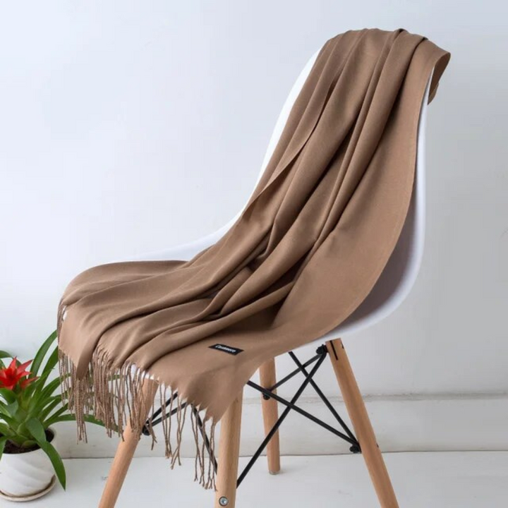 Close-up of the soft fabric and pattern on the women's winter scarf