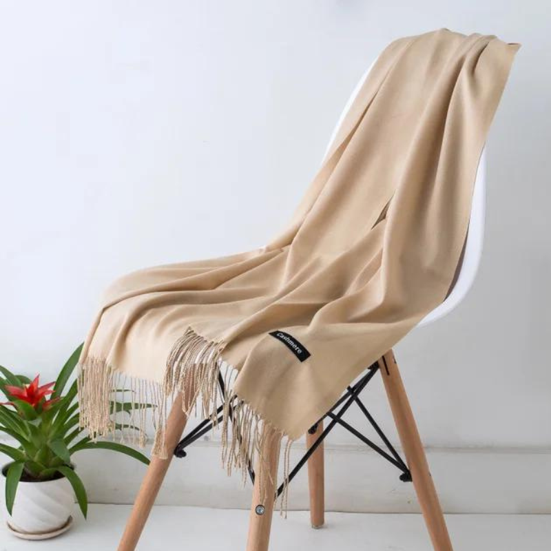 Stylish women scarf draped elegantly over shoulders for autumn fashion