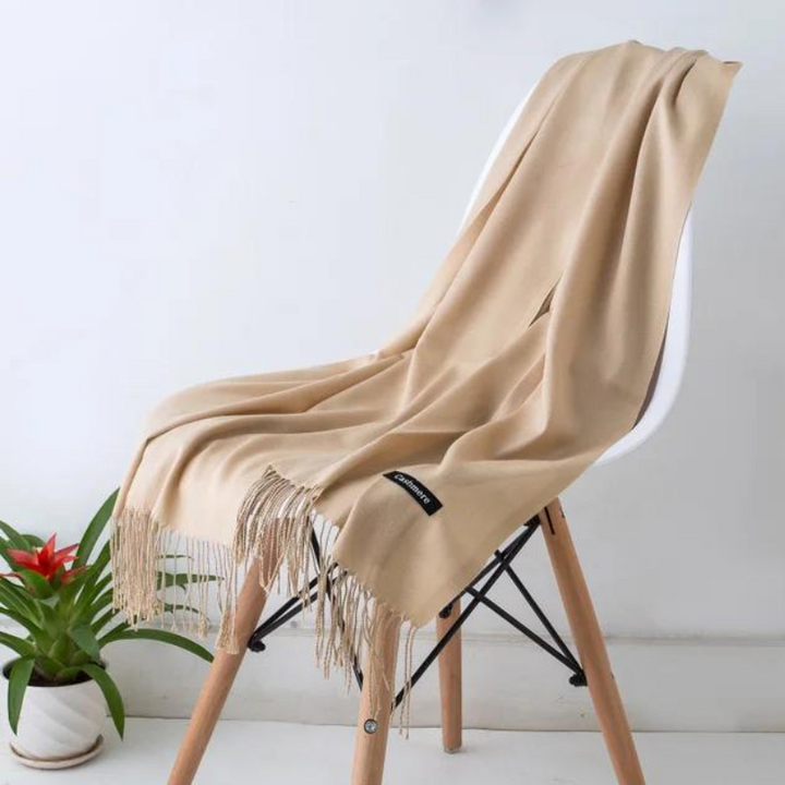 Stylish women scarf draped elegantly over shoulders for autumn fashion