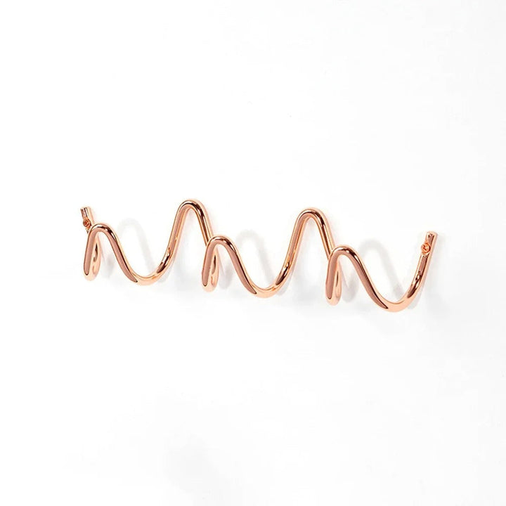 Bathroom hardware wrought iron wall coat rack in a minimalist space