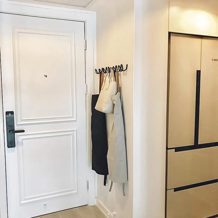 Entryway organizer wrought iron coat rack angled perspective view