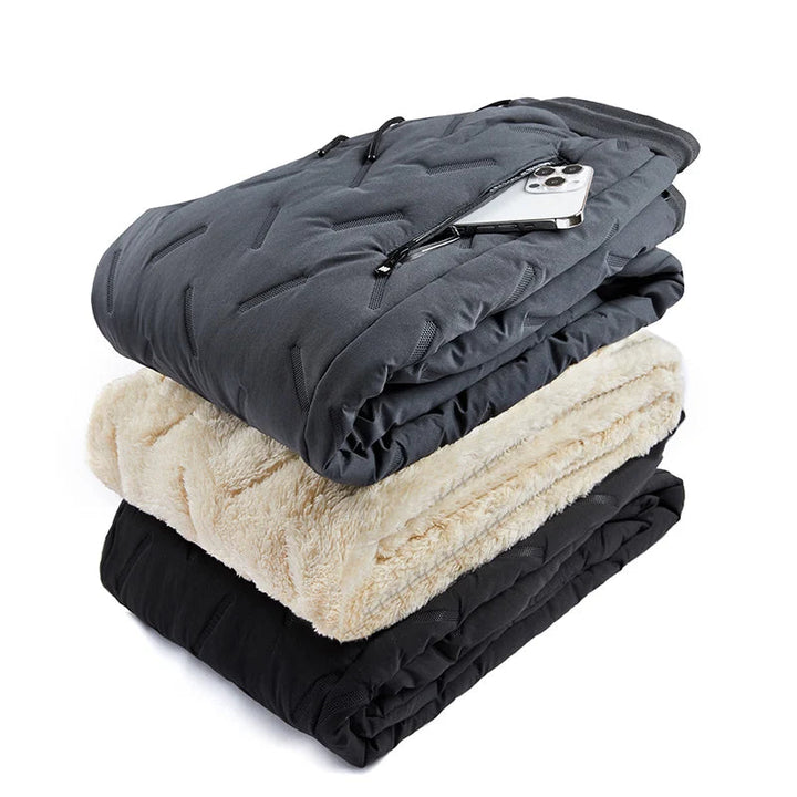 Outdoor winter pants for men with fleece lining and zippered pockets, side view