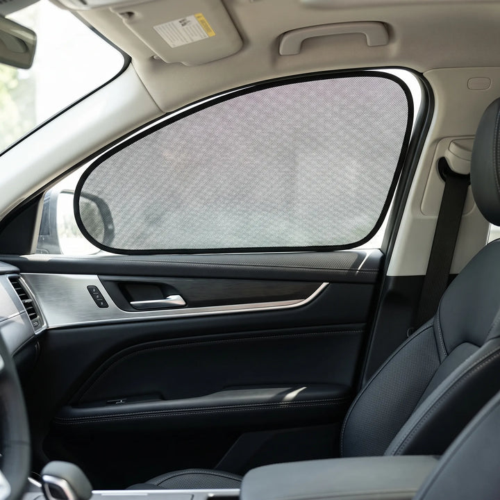 Static cling car sun shade installed on a vehicle side window