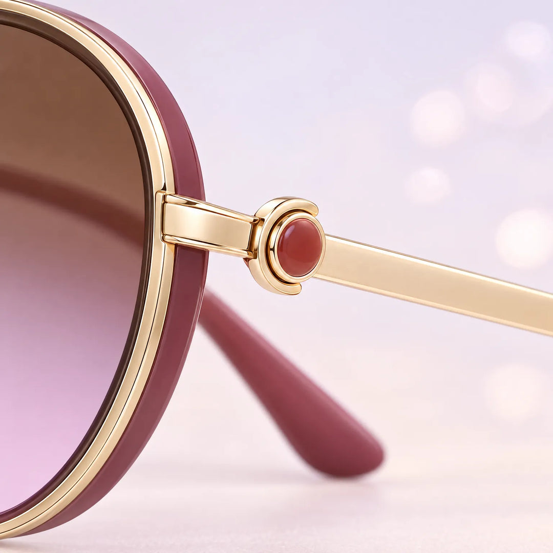Flat lay of women's accessories including oversized round vintage sunglasses