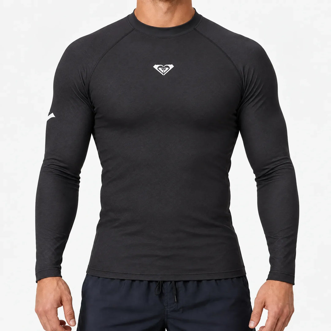 Man wearing a black athletic long sleeve rashguard swim shirt