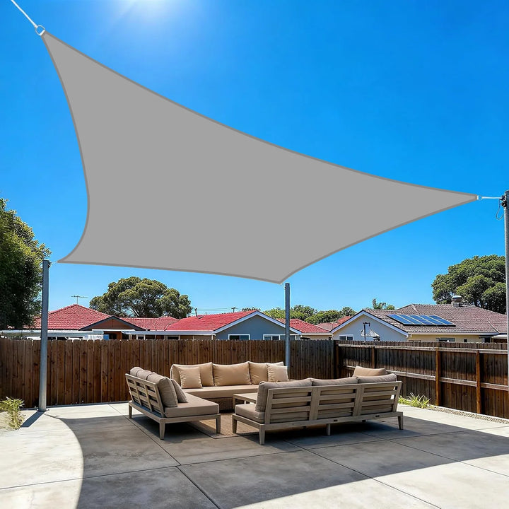 Stylized lifestyle shot of the rectangular patio shade sail in summer