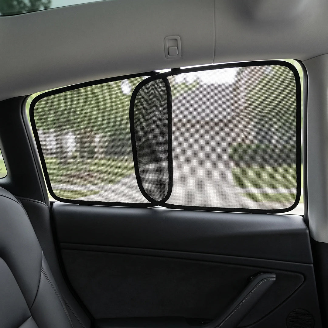 Interior view of custom black car window sun shade installed on rear window