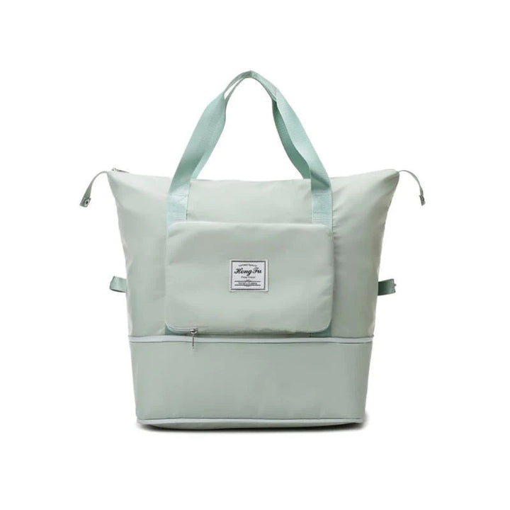 Demonstration of how the large capacity travel bag folds down into a compact pouch