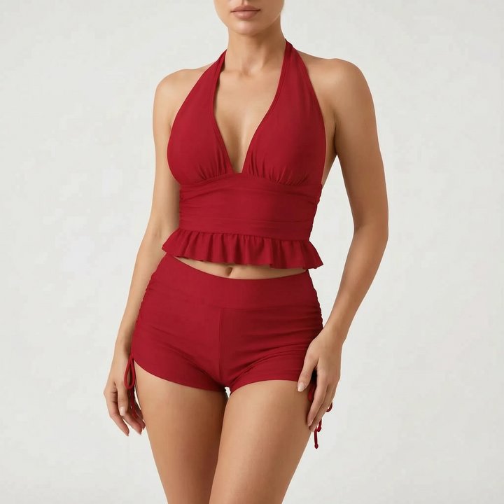 Flat lay of the womens beachwear ruched swimsuit and matching bottoms