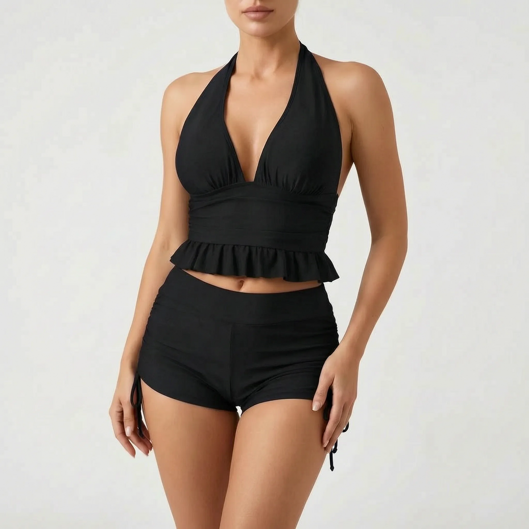 Model wearing the summer fashion two-piece swim set by the pool