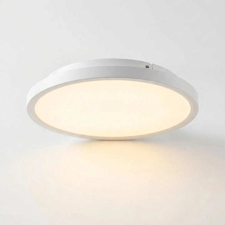 Low profile design of the Altira smart ceiling light emitting warm white illumination