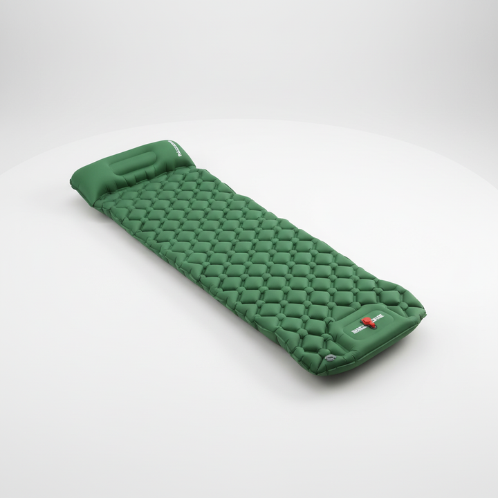 Close-up of the integrated foot pump on the camping mat for easy inflation