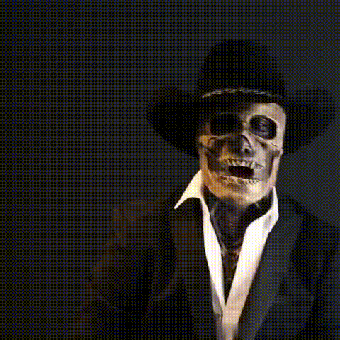 Person wearing the skeleton mask paired with a dark cowboy hat