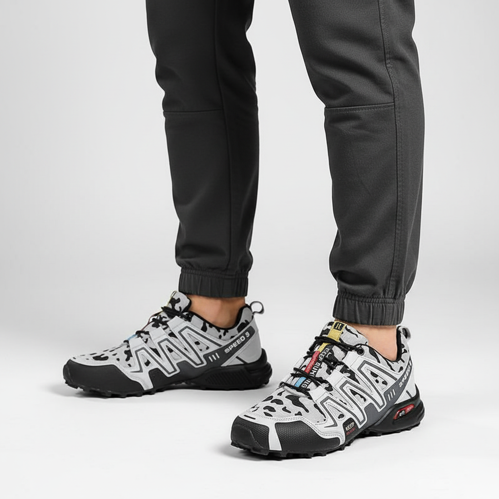 Pair of trail shoes for outdoor walking, highlighting lightweight design and breathable fabric.
