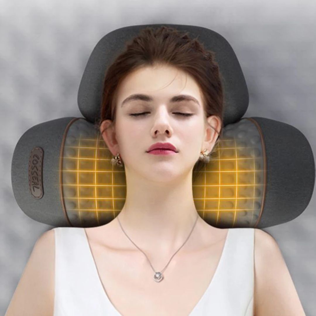 Woman relaxing while using the heated neck massager pillow