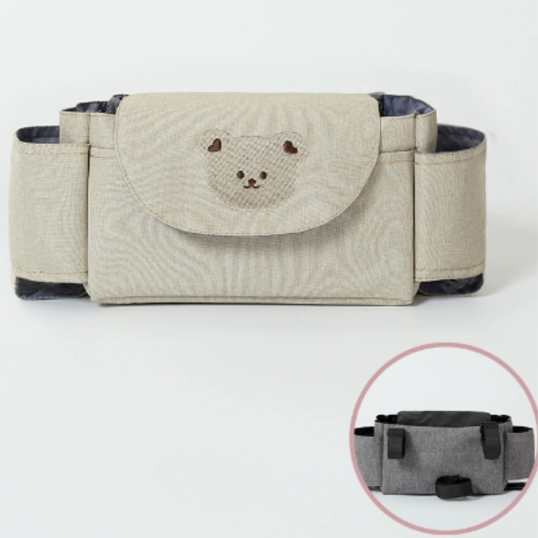 Beige baby stroller hanging organizer bag with cute embroidered teddy bear pattern