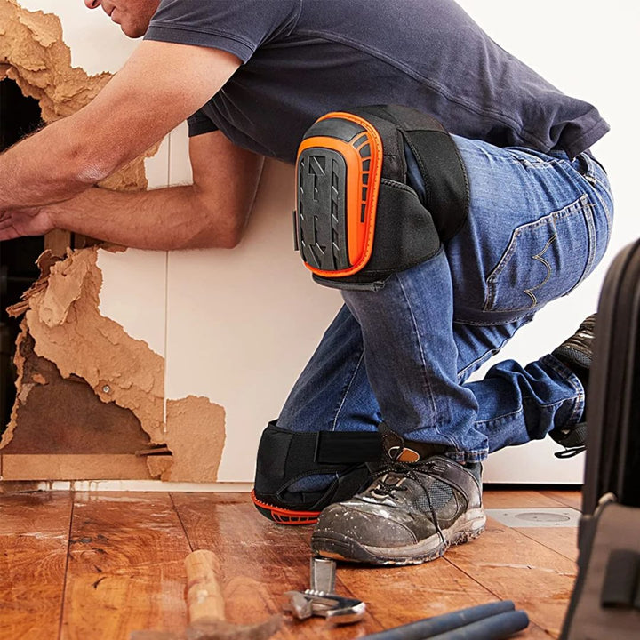 Adjustable straps and heavy-duty buckles on protective construction knee pads