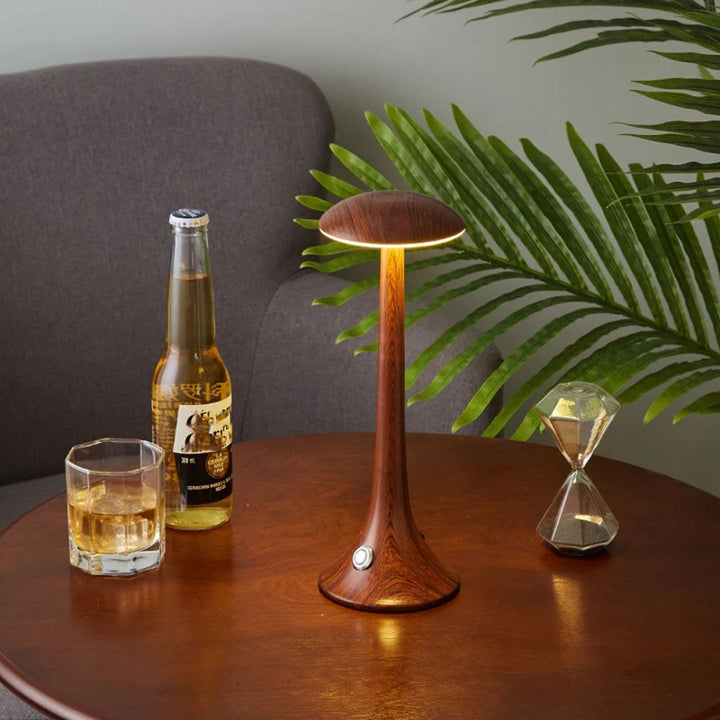 Minimalist LED table lamp with a mushroom silhouette ideal for bedroom nightstands