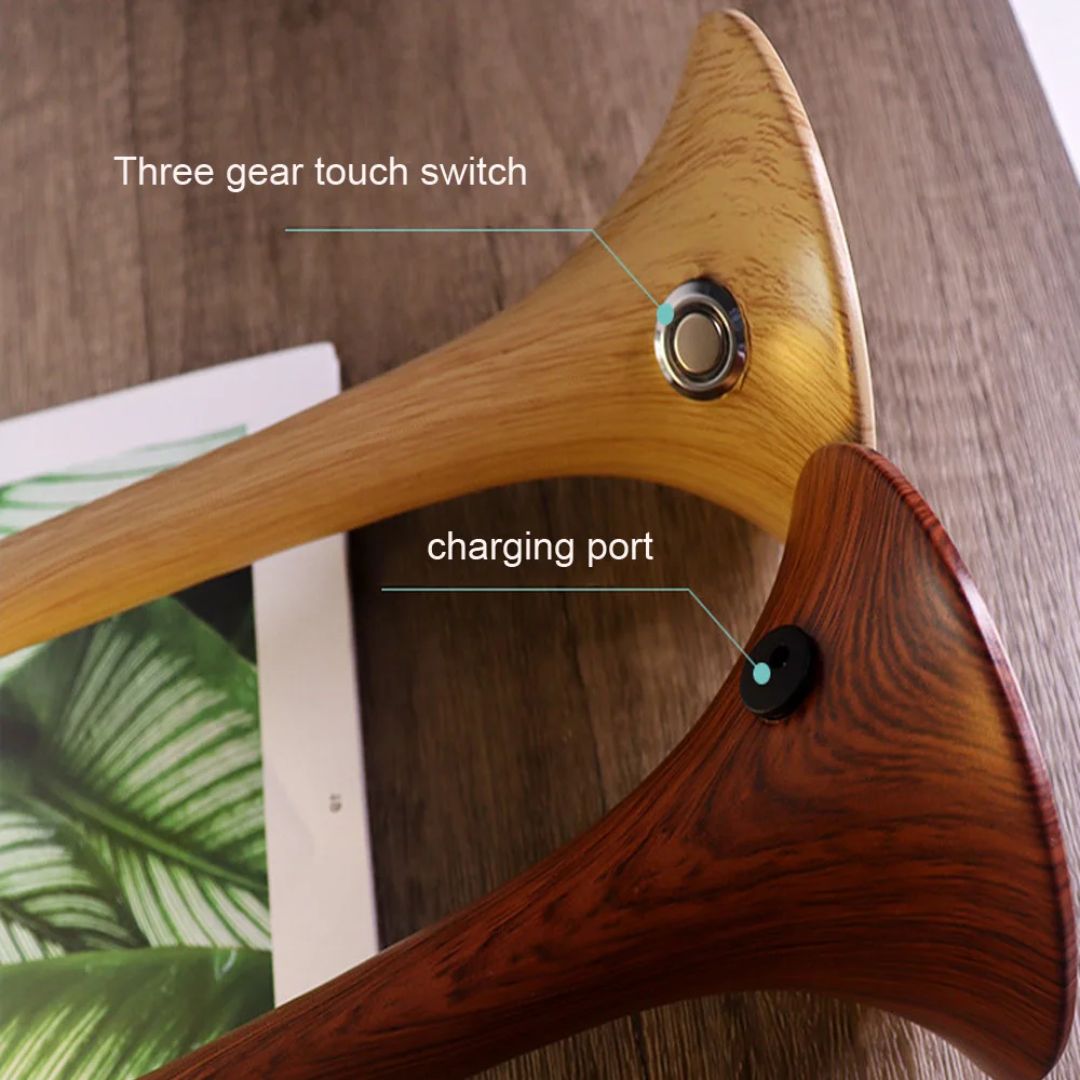 Rechargeable led mushroom lamp providing warm ambient lighting on a wooden desk