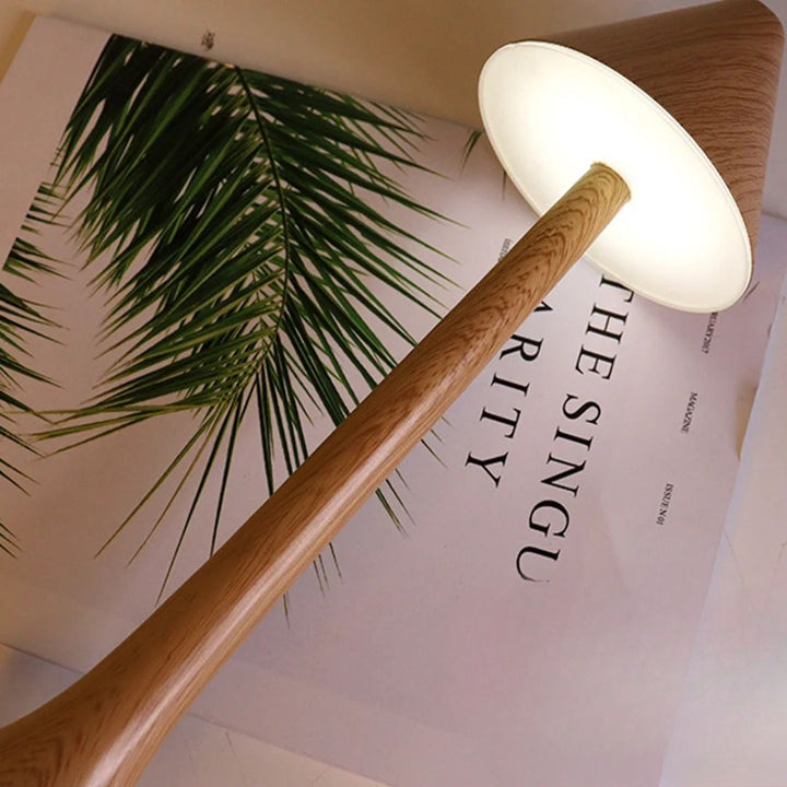 Cordless ambient mushroom table lamp featuring a sleek modern design for home decor