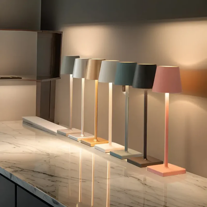 Rechargeable table lamp illuminating a cozy space with warm LED glow and stylish silhouette