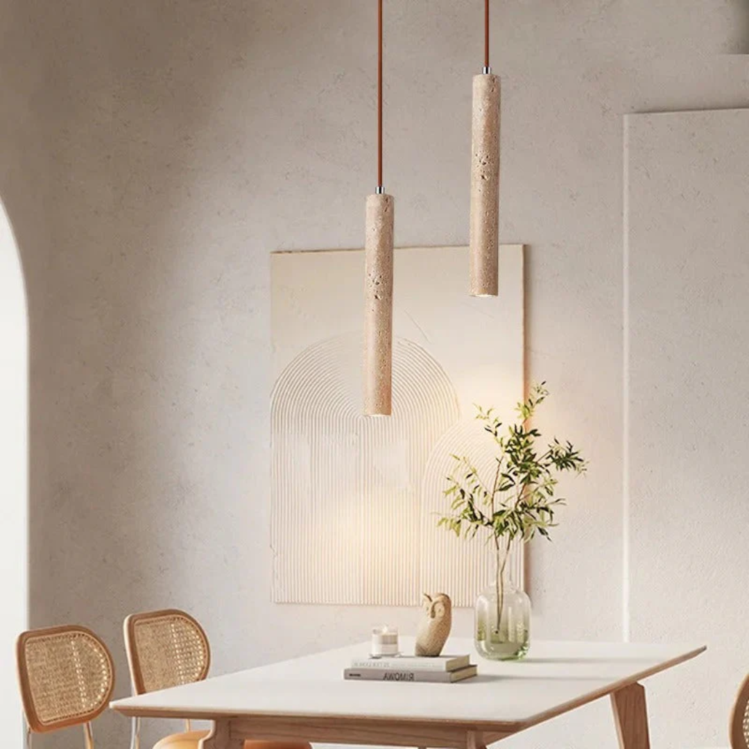 Elegant minimalist chandelier casting warm light in a luxury interior