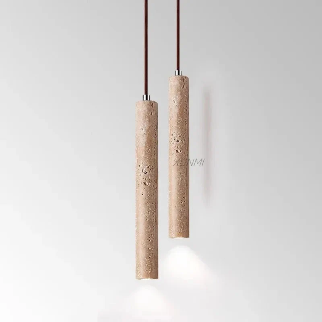 Two travertine LED cylinder pendants hanging against a plain white background