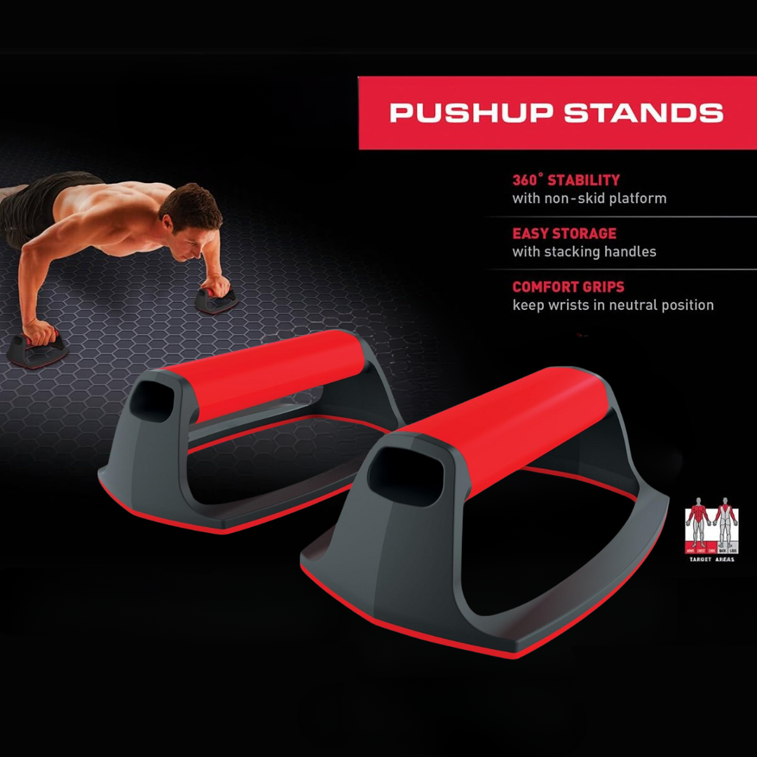 Man demonstrating proper form using push-up stands in a home workout