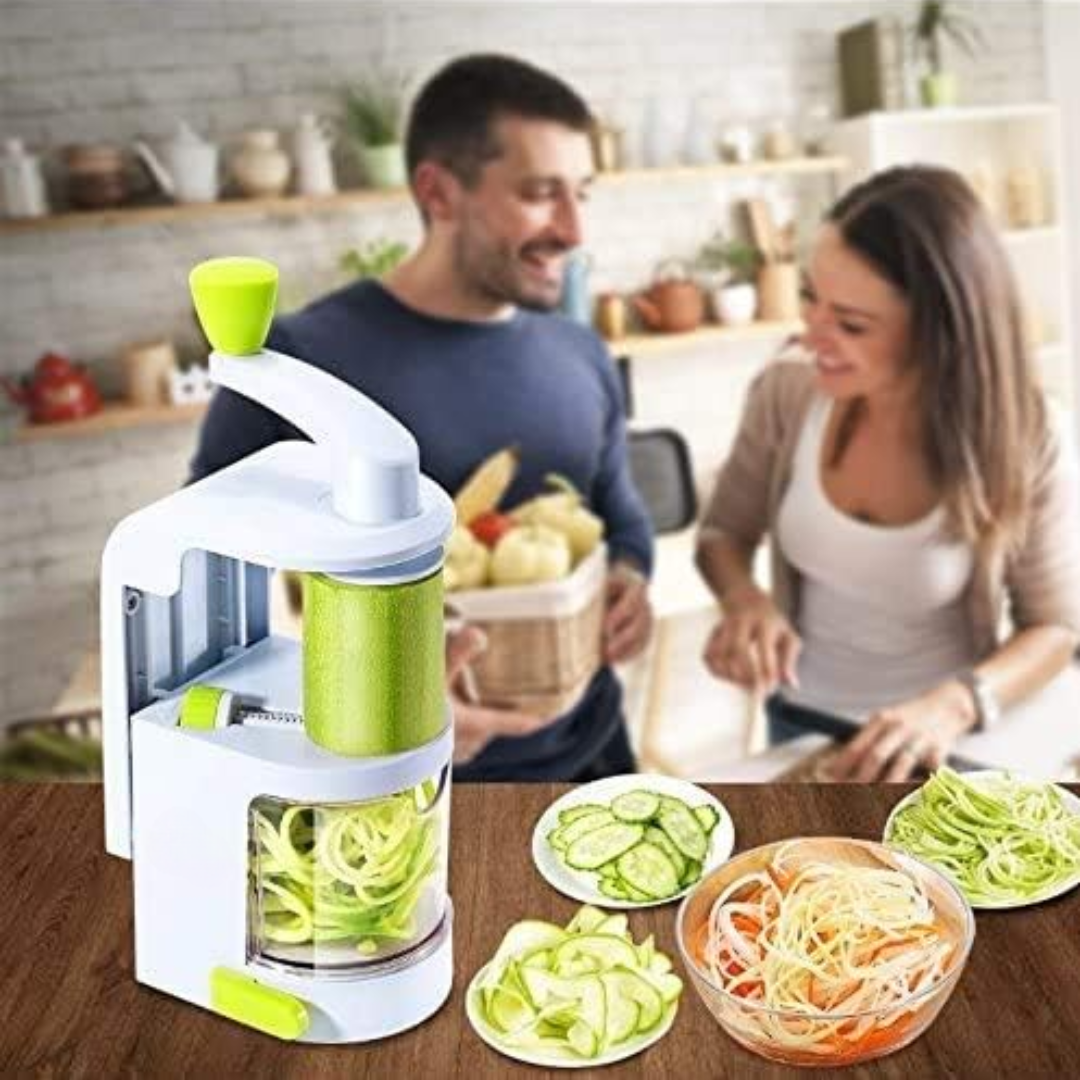 People preparing healthy meals using the vegetable slicer in a kitchen