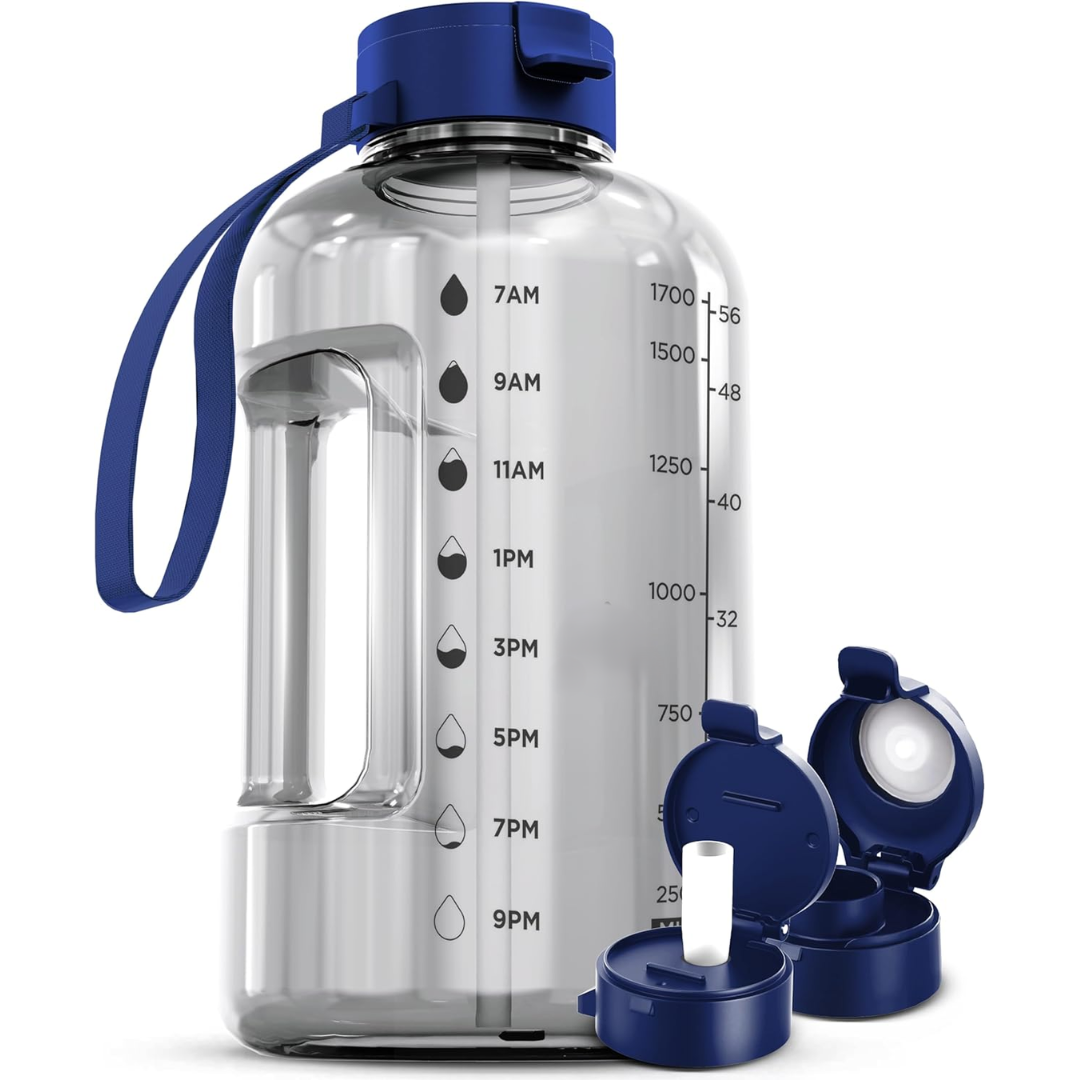 Gym fitness drinkware 2L bottle placed on a yoga mat outdoors