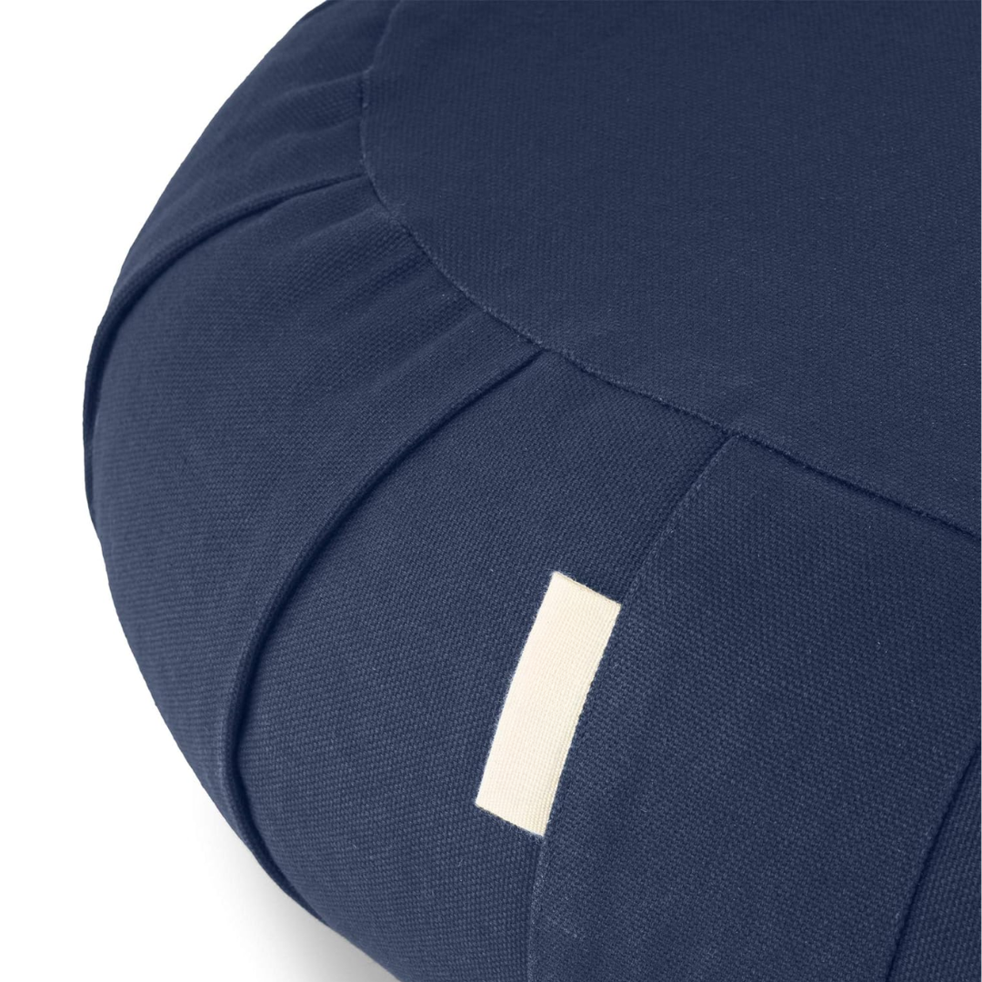 Side profile of EcoCalm curved meditation cushion showcasing ergonomic yoga pillow design