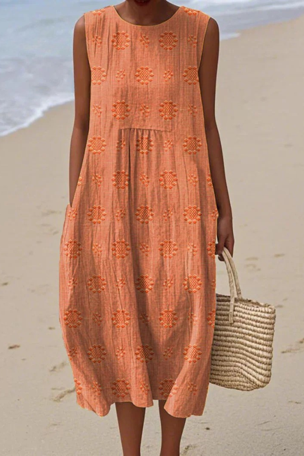Back view of women's sleeveless embroidered midi summer dress with pockets