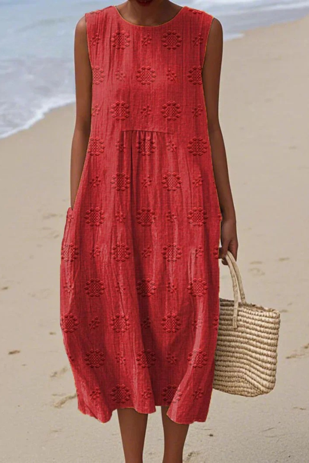 Close-up detail of embroidery pattern on casual midi dress for women