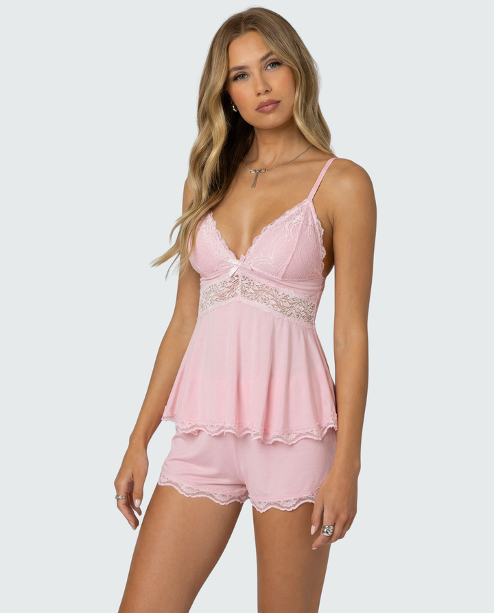 Close-up of model wearing the pink lace bralette top