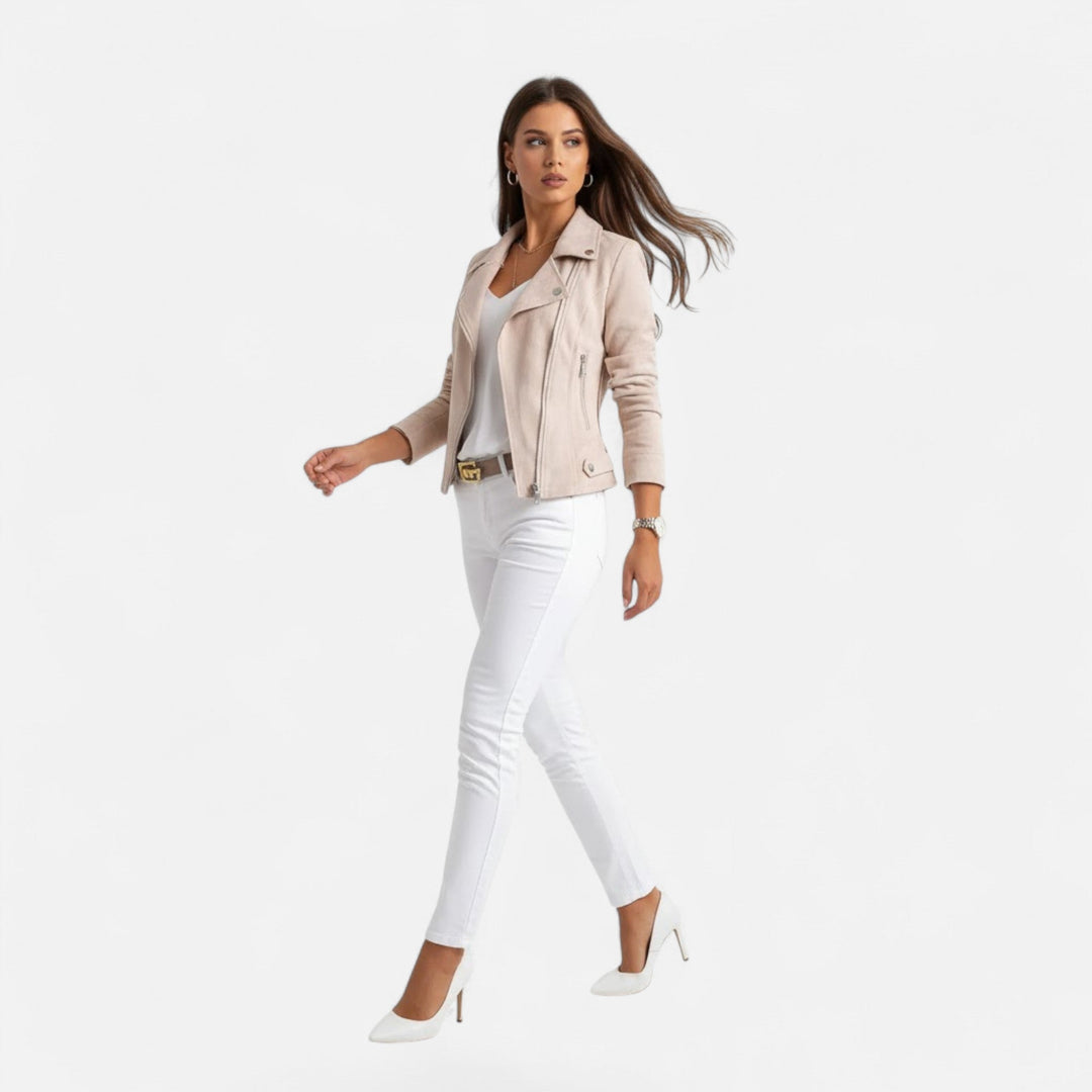 Model wearing apricot slim fit biker jacket with white pants