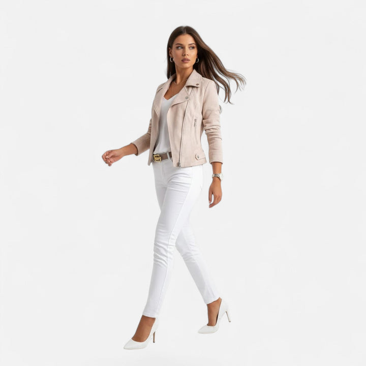 Model wearing apricot slim fit biker jacket with white pants