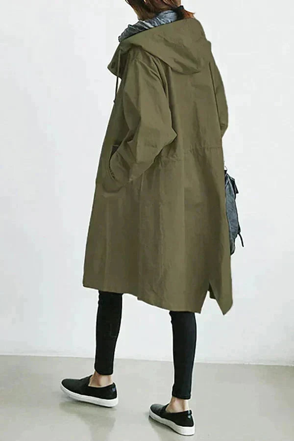 Women's hooded water-resistant raincoat front view in urban style
