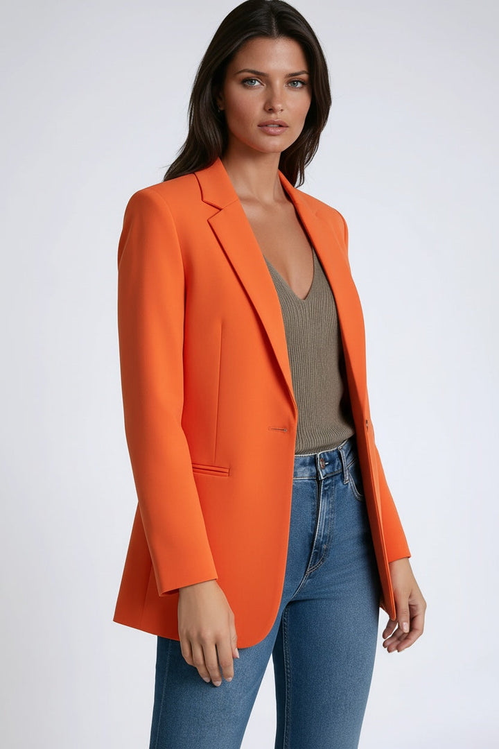Back view of the tailored jacket showing its structured longline fit