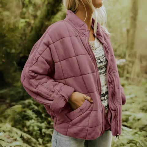 Interior lining and stitching of a cozy women's winter jacket