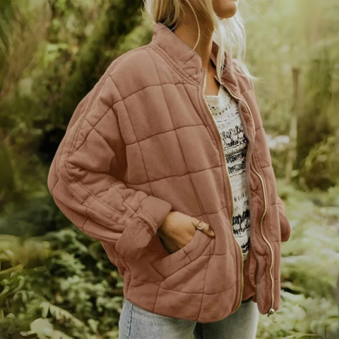 Back view of women's casual winter puffer jacket showing oversized fit