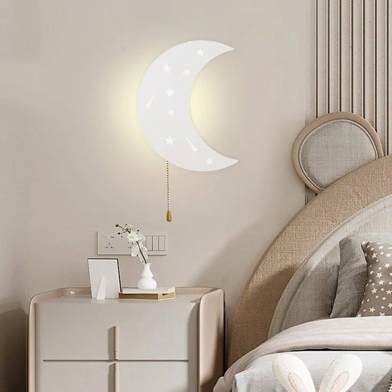 Modern moon wall lamp glowing softly in a cozy Scandinavian bedroom setup