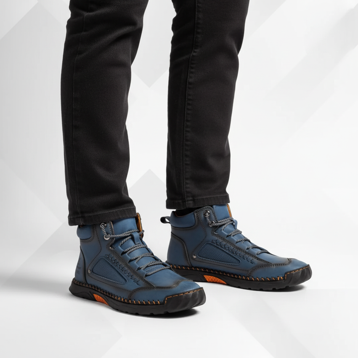 Waterproof mens ankle boots viewed from the side, showing durable outdoor tread