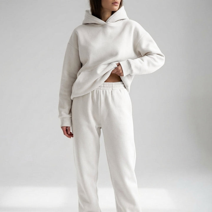 Flat lay of tracksuit set highlighting casual wear aesthetic and texture